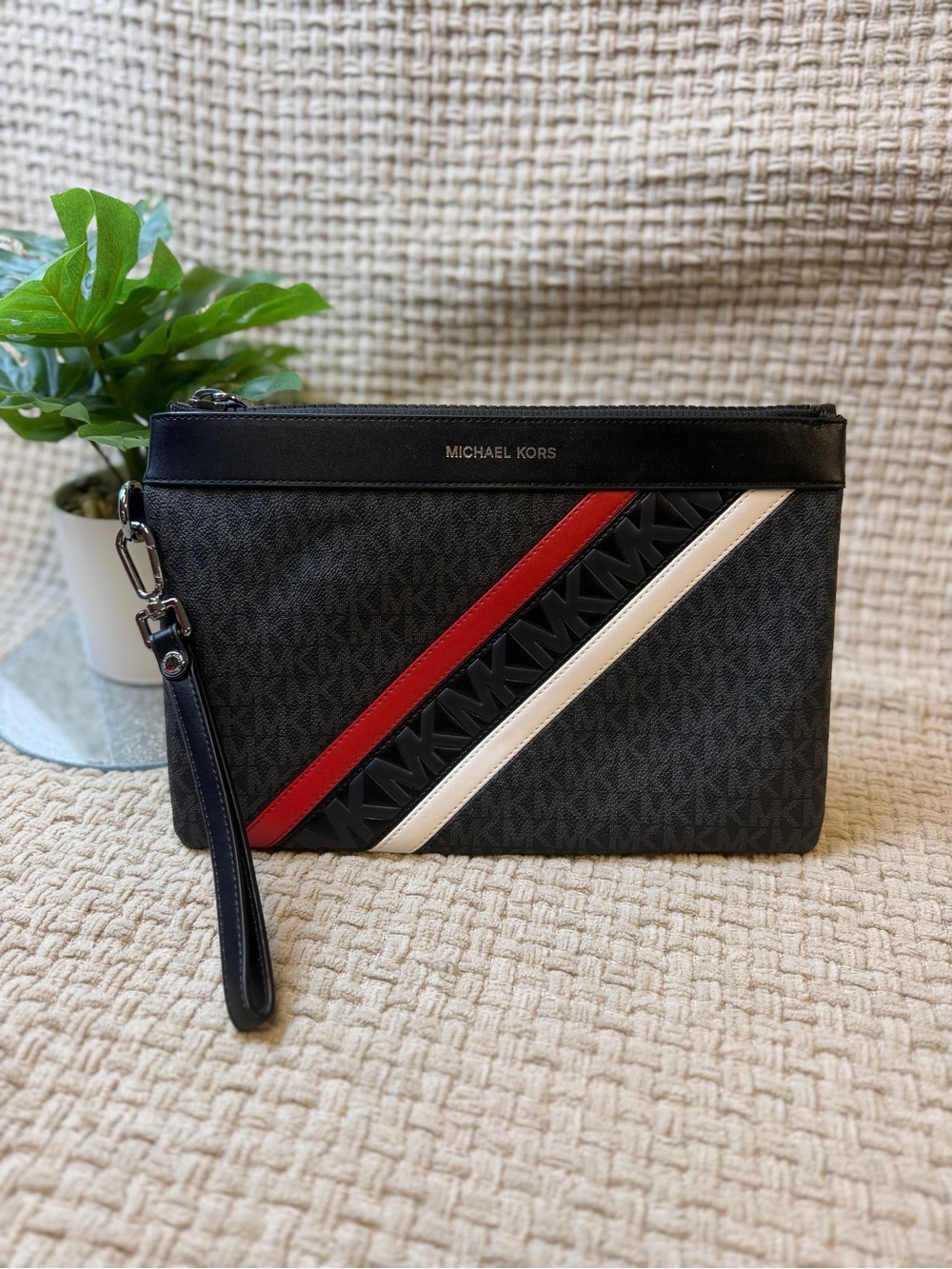 Michael Kors Black Wristlet with Red and White Diagonal Stripes